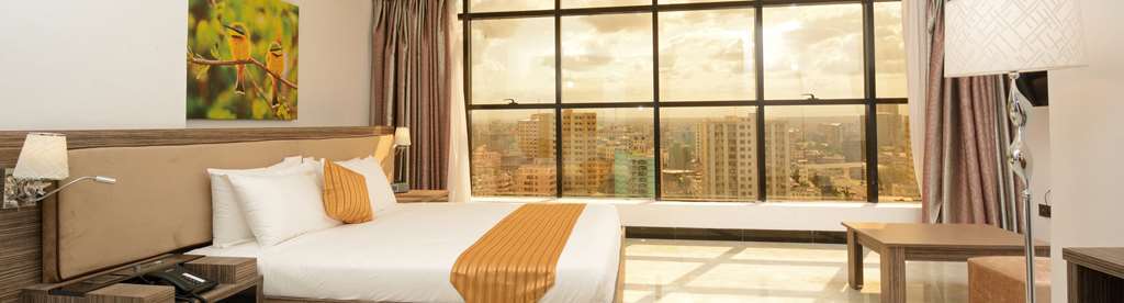 Golden Tulip Dar Es Salaam City Center Hotel Room photo